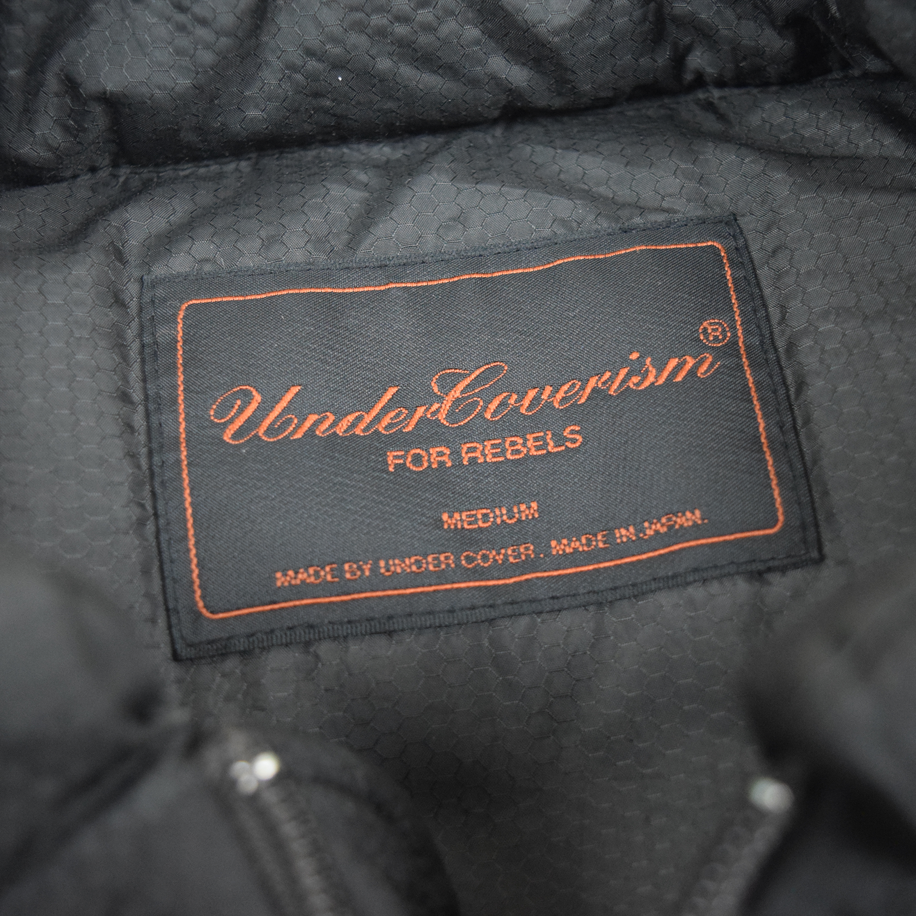 Undercover AW03 Paper Doll Hybrid Dog Camo Puffer Jacket